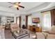 Spacious living room with large windows and comfortable seating at 1364 Centre Court Ridge Dr # 201, Reunion, FL 34747