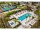 Resort-style pool, hot tub, pickleball and tennis courts at 1364 Centre Court Ridge Dr # 201, Reunion, FL 34747