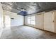 View of empty living room with multiple windows at 14025 Royal Fern Way, Astatula, FL 34705