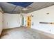 Empty living room with carpet and view to the kitchen at 14025 Royal Fern Way, Astatula, FL 34705