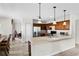 Well-lit kitchen with stainless steel appliances and a convenient breakfast bar at 1907 Lakeview Way, Kissimmee, FL 34759