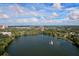 Aerial view showcasing lake, fountain, and surrounding neighborhood at 400 E Colonial Dr # 207, Orlando, FL 32803