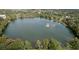 Aerial view of a peaceful lake with sailboats and fountain at 400 E Colonial Dr # 207, Orlando, FL 32803