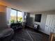 Bedroom with a view, large window, and comfortable seating at 400 E Colonial Dr # 207, Orlando, FL 32803