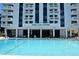 Building exterior with swimming pool in front at 400 E Colonial Dr # 207, Orlando, FL 32803