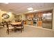 Community kitchen with stainless steel appliances and wood cabinets at 400 E Colonial Dr # 207, Orlando, FL 32803