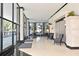 Elegant condo lobby with seating and large windows at 400 E Colonial Dr # 207, Orlando, FL 32803