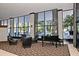 Lobby with comfortable seating and a piano at 400 E Colonial Dr # 207, Orlando, FL 32803