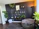 Relaxing room with many plants, shelving and a beanbag chair at 400 E Colonial Dr # 207, Orlando, FL 32803