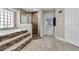 Bright bathroom featuring a soaking tub with a shower stall and a door leading to the patio at 8048 Canyon Lake Cir, Orlando, FL 32835