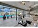 A fully screened lanai with plenty of room for dining and an outdoor kitchen at 8048 Canyon Lake Cir, Orlando, FL 32835