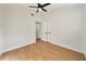 An empty bedroom featuring hardwood floors and a ceiling fan at 133 Pinecrest Dr, Sanford, FL 32773