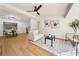 Bright and airy living room with hardwood floors and modern decor at 133 Pinecrest Dr, Sanford, FL 32773