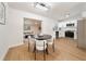Open-concept space with modern kitchen and adjacent dining and living areas at 133 Pinecrest Dr, Sanford, FL 32773