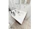 Bathroom vanity with a white countertop, sleek faucet, large mirror, and a soap dispenser at 1918 Conway Rd # 3, Orlando, FL 32812