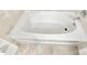 Clean bathtub with chrome faucet and tile surround in a well-maintained bathroom at 1918 Conway Rd # 3, Orlando, FL 32812