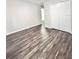 Neutral bedroom offering spacious closet storage and luxury vinyl plank flooring at 1918 Conway Rd # 3, Orlando, FL 32812