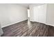Neutral bedroom offering spacious closet storage and luxury vinyl plank flooring at 1918 Conway Rd # 3, Orlando, FL 32812