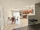Kitchen and eat-in dining area with stainless steel appliances and tile flooring at 1918 Conway Rd # 3, Orlando, FL 32812