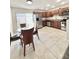 Bright kitchen featuring stainless steel appliances, granite countertops, and a dining area at 1918 Conway Rd # 3, Orlando, FL 32812