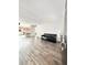 Spacious living room with hard wood floors that leads into the kitchen at 1918 Conway Rd # 3, Orlando, FL 32812