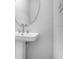 Elegant bathroom featuring a large mirror and a modern sink at 2990 Arranmore Dr, Ormond Beach, FL 32174