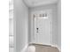 Inviting entryway featuring a stylish front door with glass panels at 2990 Arranmore Dr, Ormond Beach, FL 32174