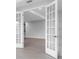 Bright living room with double French doors leading to other areas of the house at 2990 Arranmore Dr, Ormond Beach, FL 32174