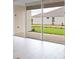 A view of a patio featuring a large sliding glass door for easy indoor/outdoor living at 2990 Arranmore Dr, Ormond Beach, FL 32174