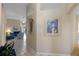 Bright and spacious entryway with tile flooring, leading to the living room and other areas at 401 Montara Dr, Davenport, FL 33897