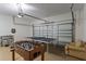 Finished garage with foosball, ping pong, and seating at 401 Montara Dr, Davenport, FL 33897