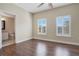 Bedroom with hardwood floors and ensuite bathroom at 4712 Anson Ln, Orlando, FL 32814
