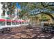 Brick paved plaza with picnic tables near shops and restaurants at 4712 Anson Ln, Orlando, FL 32814