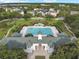 Community pool and clubhouse viewed from above at 4712 Anson Ln, Orlando, FL 32814
