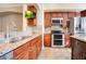 Modern kitchen with granite countertops and stainless steel appliances at 4712 Anson Ln, Orlando, FL 32814