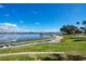 Scenic waterfront view with gazebo and walking path at 4712 Anson Ln, Orlando, FL 32814