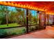 Relaxing screened porch overlooking a lush backyard at 6408 Shoreline Ct, St Cloud, FL 34771