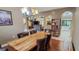 View of dining room looking into kitchen and living room at 6408 Shoreline Ct, St Cloud, FL 34771