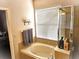 Bathroom with a bathtub and shower combo at 9564 Venezia Plantation Dr, Orlando, FL 32829