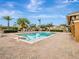 Refreshing community pool with lounge chairs and a patio area at 9564 Venezia Plantation Dr, Orlando, FL 32829