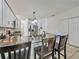 Kitchen features granite countertops, an island, and stainless steel fridge at 9564 Venezia Plantation Dr, Orlando, FL 32829