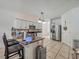 Modern kitchen with granite countertops and stainless steel appliances at 9564 Venezia Plantation Dr, Orlando, FL 32829