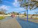 playground with swings and play structures at 9564 Venezia Plantation Dr, Orlando, FL 32829