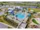 Aerial view of community pool, playground, and amenities at 11904 Founders St, Orlando, FL 32832