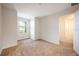 Bright bedroom with window and adjacent bathroom access at 11904 Founders St, Orlando, FL 32832
