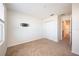Simple bedroom with double door closet and wall-mounted TV at 11904 Founders St, Orlando, FL 32832