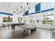 Bright recreation room with ping pong and billiard tables at 11904 Founders St, Orlando, FL 32832