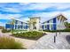 Community clubhouse with landscaped walkways at 11904 Founders St, Orlando, FL 32832