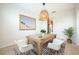 Bright dining room with wood table and chairs at 11904 Founders St, Orlando, FL 32832
