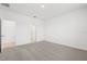 Bedroom with access to bathroom and carpet flooring at 2121 Rosewood Dr, Bartow, FL 33830
